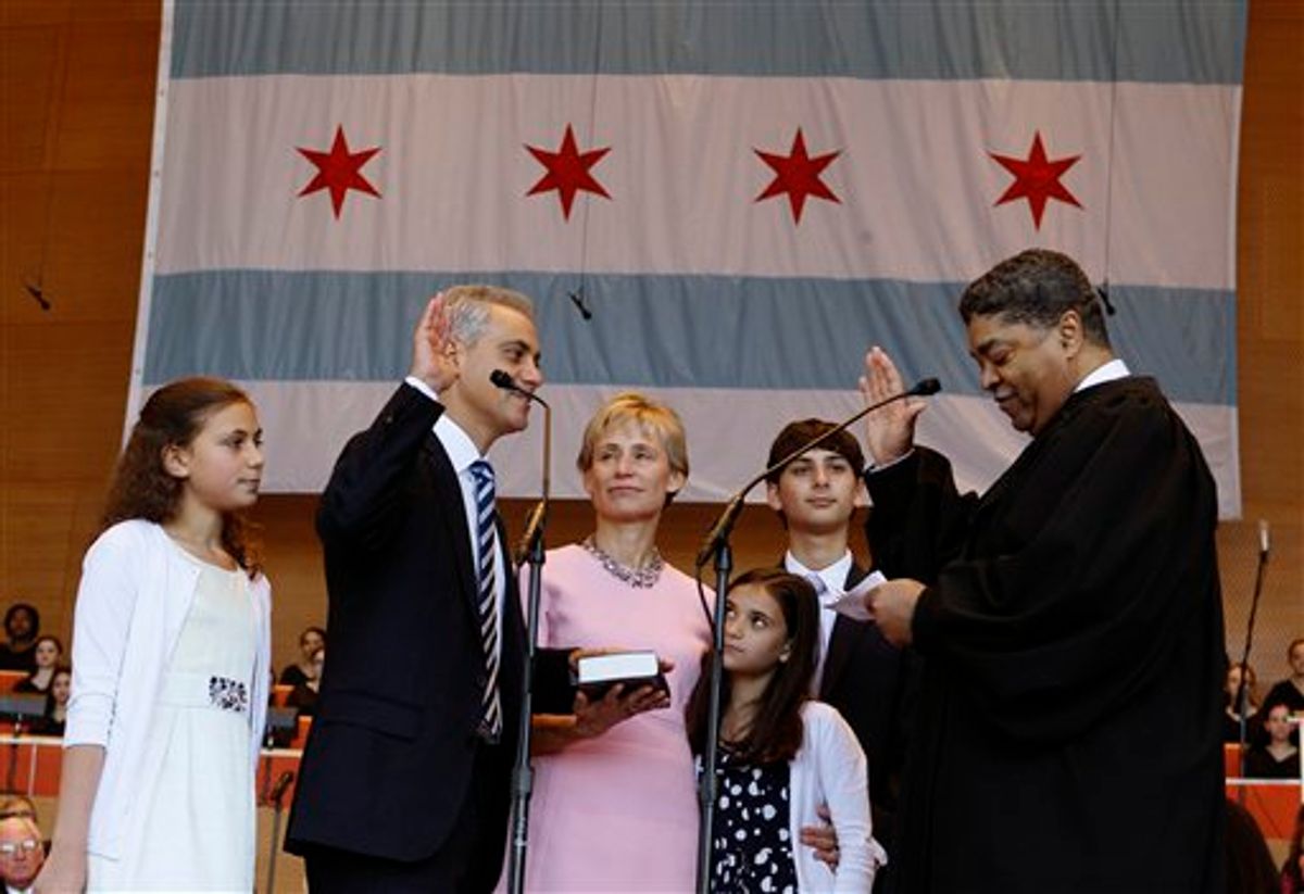 Rahm Emanuel takes the oath of office of Mayor of Chicago from Timothy C. Evans, Chief Judge of the Circuit Court of Cook County during inaugural ceremonies Monday, May 16, 2011 in Chicago. Watching are from left, daughter Ilana, wife Amy Rule, daughter Leah and son Zacharia. (AP Photo/Charles Rex Arbogast) (AP)