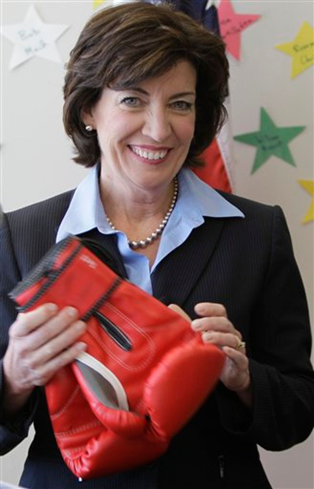 Democratic candidate for the 26th District Congressional seat, Kathy Hochul speaks while holding a pair of boxing gloves during a news conference in Clarence, N.Y., Monday, May 9, 2011. (AP Photo/David Duprey) (AP)