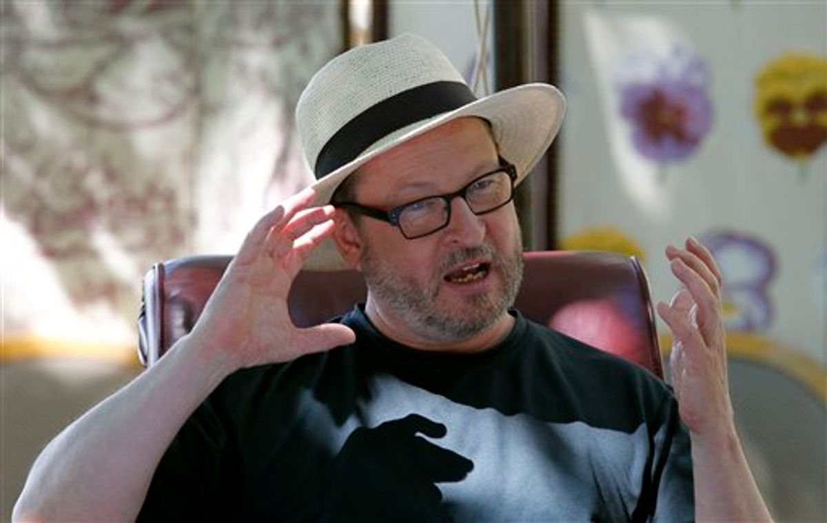Director Lars Von Trier poses for photos during an interview in Mougins, southern France, Friday, May 20, 2011. On Thursday, May 19, 2011 the Danish filmmaker was booted out of the Cannes Film Festival for a bizarre, rambling news conference in which he said he sympathizes with Adolph Hitler. (AP Photo/Francois Mori) (AP)