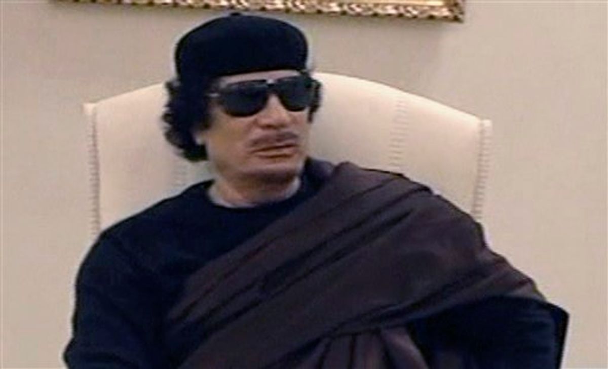 In this image made from Libyan TV, Libyan leader Moammar Gadhafi holds a meeting with tribal leaders from eastern Libya,  in Tripoli, Libya, Wednesday, May 11,  2011. (AP Photo / Libyan TV via APTN) TV OUT LIBYA OUT (AP)