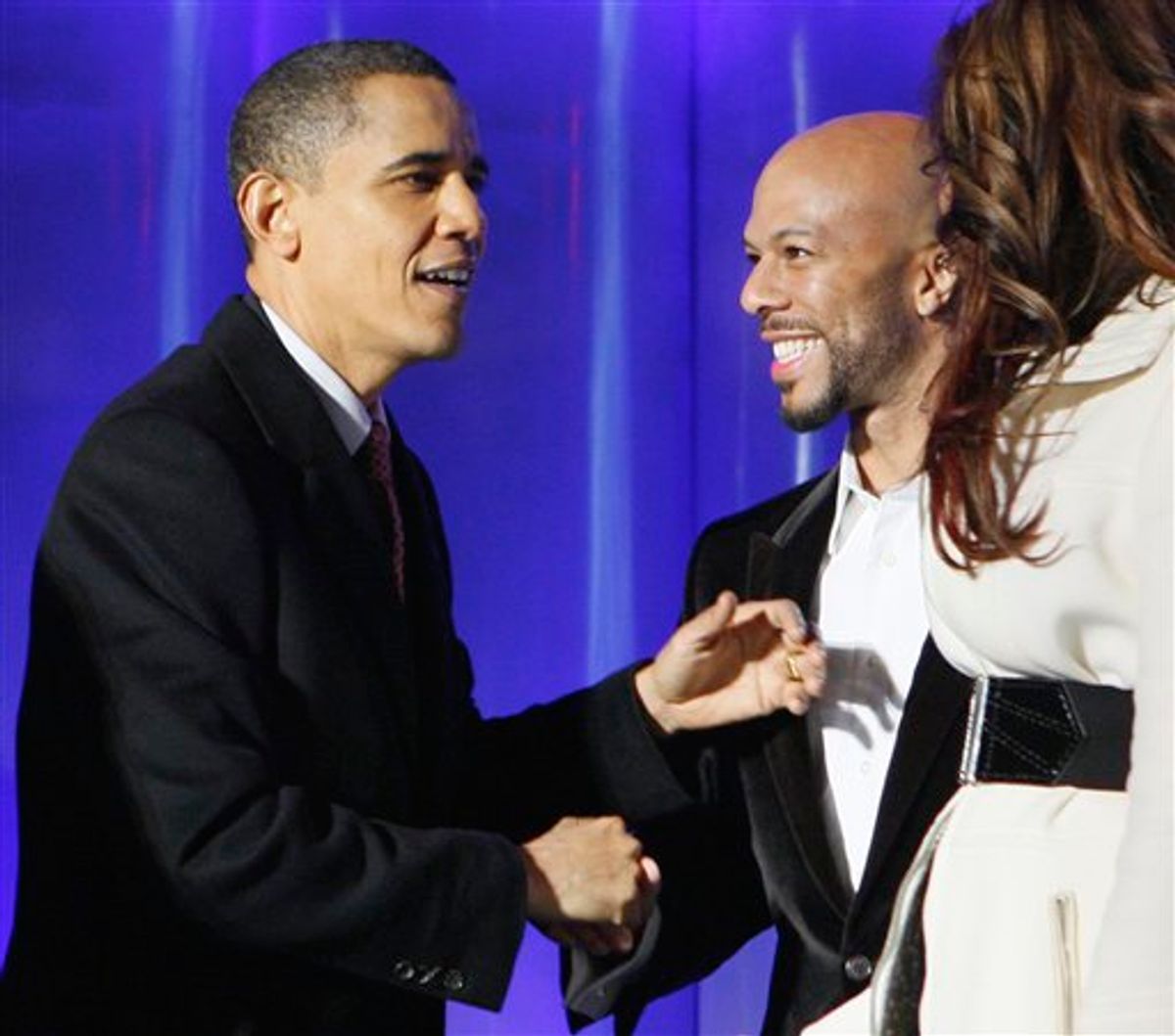 FILE - In this Dec. 3, 2009 file photo, President Barack Obama greets rapper Common at the National Christmas Tree Lighting Ceremony in Washington. Michelle Obama's "evening of poetry" at the White House set off Republican critics before the artists had uttered a word. But it was the inclusion of Common that set off Republicans. Common, who is considered fairly tame as rappers go, is known for rhymes that tend to be socially and politically conscious. (AP Photo/Charles Dharapak, File) (AP)