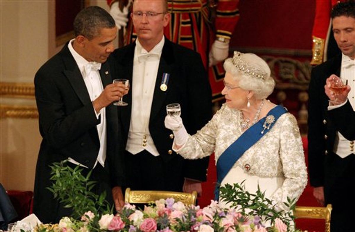 Britain's Queen Elizabeth II, and U.S. President Barack Obama during a state banquet in Buckingham Palace, London, on Tuesday May 24, 2011. President Barack Obama immersed himself in the grandeur of Britain's royal family Tuesday, as Queen Elizabeth II welcomed him to Buckingham Palace for the first day of a state visit. (AP Photo/Lewis Whyld, Pool) (AP)