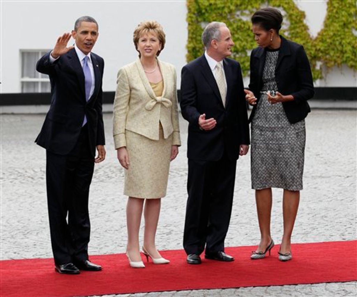 From left, President Barack Obama, President of Ireland Mary McAleese and her husband Martin McAleese, and first lady Michelle Obama stop to be photographed as President Barack Obama arrives at the Presidential Residence in Dublin, Ireland, Monday, May 23, 2011. President Barack Obama opens a six-day European tour with a quick dash through Ireland, where he will celebrate his own Irish roots and look to give a boost to a nation grappling with the fallout from its financial collapse.(AP Photo/Carolyn Kaster)  (AP)
