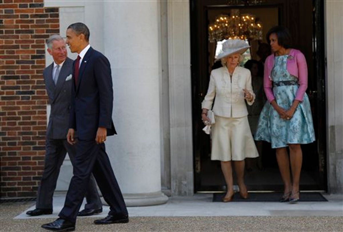 U.S. President Barack Obama, second left, and first lady Michelle Obama, right, walk with Britain's Prince Charles, left, and Camilla, the Duchess of Cornwall, at Winfield House in London, Tuesday, May 24, 2011. (AP Photo/Charles Dharapak) (AP)