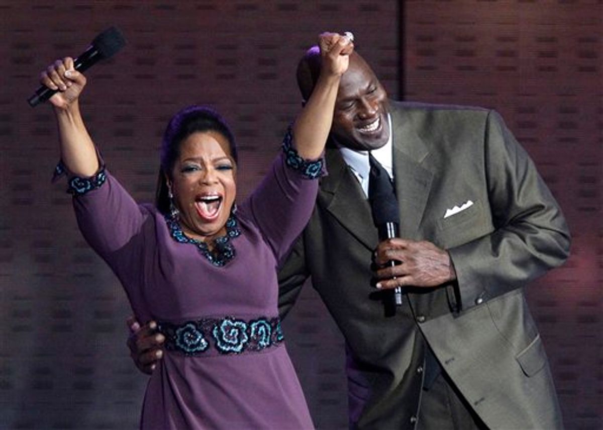 Oprah Winfrey reacts as Michael Jordan appears during a star-studded double-taping of "Surprise Oprah! A Farewell Spectacular," Tuesday, May 17, 2011, in Chicago. "The Oprah Winfrey Show" is ending its run May 25, after 25 years, and millions of her fans around the globe are waiting to see how she will close out a show that spawned a media empire. (AP Photo/Charles Rex Arbogast)   (AP)