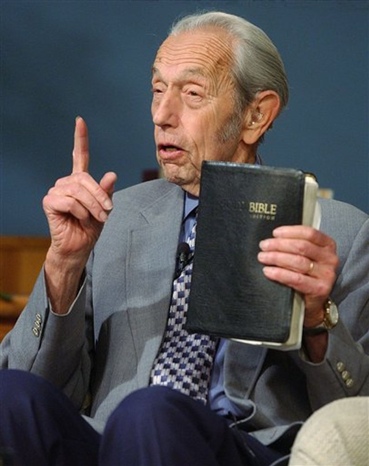 FILE - In this Dec. 12, 2002 file photo, Harold Camping speaks while holding the Bible, in San Leandro, Calif. A loosely organized Christian movement has spread the word around the globe that Jesus Christ will return to earth on Saturday, May 21, 2011, to gather the faithful into heaven. While the Christian mainstream isn't buying it, many other skeptics are believing it. The prediction originates with Camping, the 89-year-old retired civil engineer, who founded Family Radio Worldwide, an independent ministry that has broadcasted his prediction around the world. (AP Photo, File) (AP)