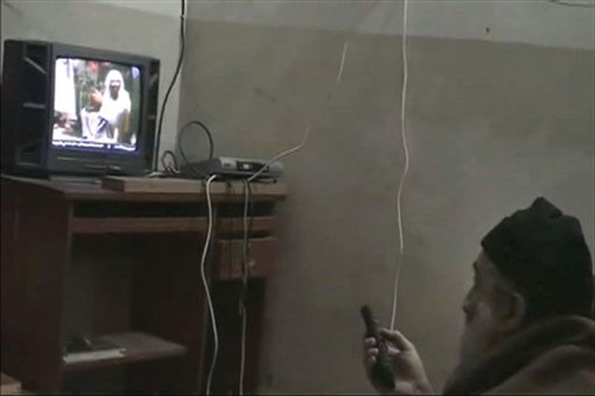 In this undated image from video seized from the walled compound of al-Qaida leader Osama bin Laden in Abbottabad, Pakistan, and released Saturday, May 7, 2011, by the U.S. Department of Defense a man, who the American government identified as Osama bin Laden, watches himself on television. U.S. intelligence would not confirm Saturday that the video of bin Laden in the makeshift office was filmed at the Pakistani compound, but they have said they believe he has been holed up in the compound for as long as six years. This and other videos released Saturday show him watching television and rehearsing for terrorist videos. (AP Photo/Department of Defense) (AP)