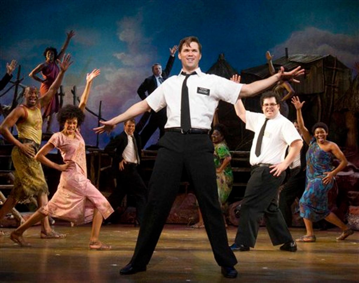 In this theater publicity image released by Boneau/Bryan-Brown, Andrew Rannells, center, performs with an ensemble cast in "The Book of Mormon" at the Eugene O'Neill Theatre in New York. (AP Photo/Boneau/Bryan-Brown, Joan Marcus)   (AP)