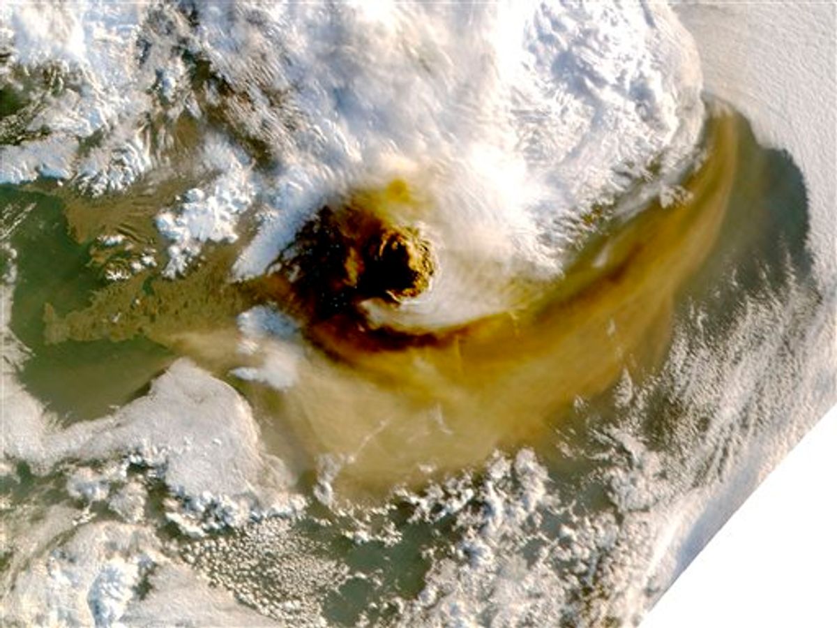 This image provided by NASA shows an image taken by a NASA MODIS satellite acquired at 1:15 a.m. EDT  on May 22, 2011 shows the ash plume from the Grimsvotn volcano casts shadow to the west. The Grimsvotn volcano began erupting on Saturday, May 21 sending clouds of ash high into the air. The amount of ash spewing from the volcano tapered off dramatically on Tuesday, however, said Elin Jonasdottir, a forecaster at Iceland's meteorological office.  The blue dots are data dropouts probably caused by the very bad light in the shadow of the plume. (AP Photo/NASA) (AP)