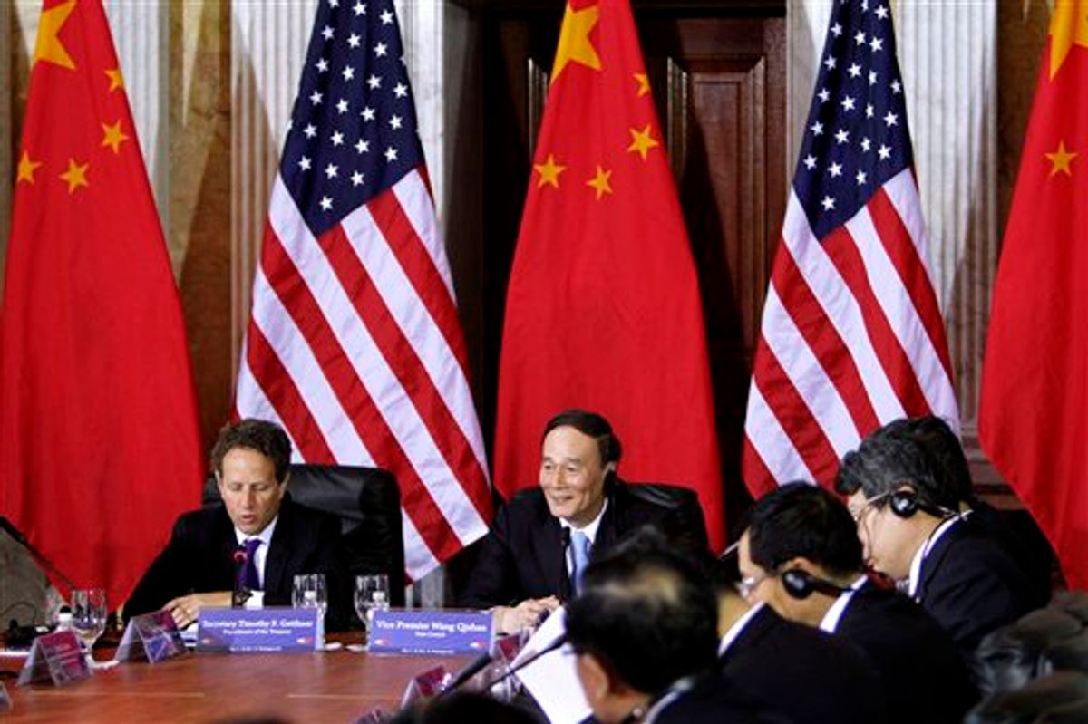 Treasury Secretary Timothy Geithner meets with China's Vice Premier Wang Qishan, center, during the US-China Strategic and Economic Dialogue meetings, Monday, May 9, 2011, at the Treasury Department in Washington. (AP Photo/Jacquelyn Martin)  (AP)