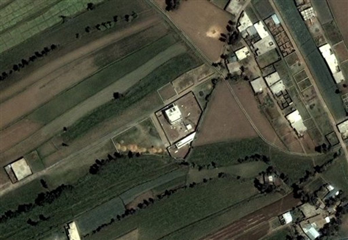 This June 15, 2005 satellite image provided by DigitalGlobe shows the compound, center, in Abbottabad, Pakistan, where Osama bin Laden lived. Bin Laden, the face of global terrorism and mastermind of the Sept. 11, 2001, attacks, was tracked down and shot to death at the compound by an elite team of U.S. forces on Monday, May 2, 2011, ending an unrelenting manhunt that spanned a frustrating decade. (AP Photo/DigitalGlobe) (AP)