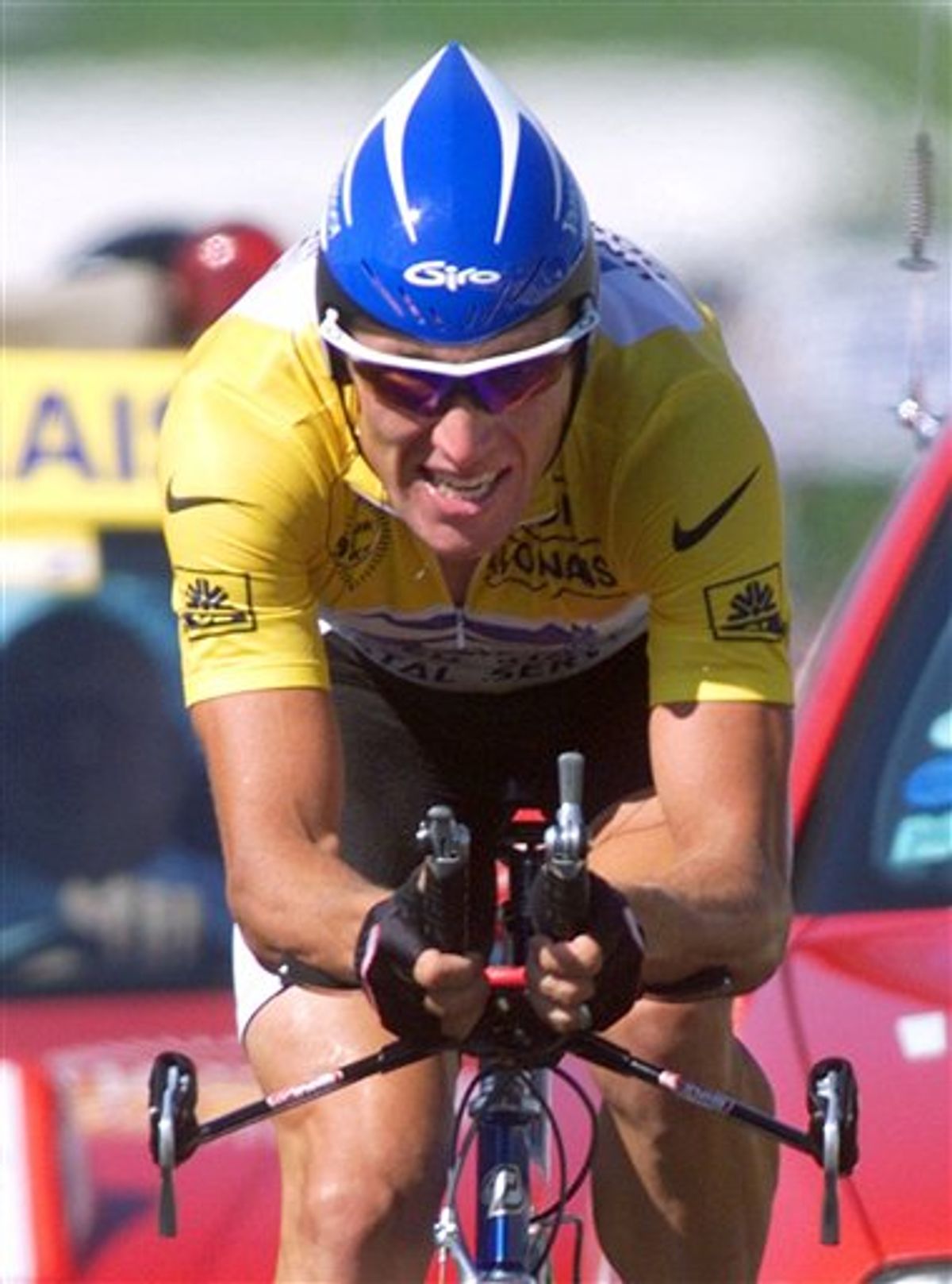 FILE - In this July 24, 1999 file photo, overall leader Lance Armstrong of the U.S. strains on his way to winning the 19th stage of the Tour de France cycling race, a 57-kilometer individual time trial around the Futuroscope theme park near Poitiers, western France. Tyler Hamilton, a former teammate of Armstrong, has told CBS News that he used performance-enhancing drugs with the seven-time Tour de France winner to cheat in cycling races, including the tour. Armstrong has steadfastly denied doping and has never failed a drug test. (AP Photo/Laurent Rebours, File)   (AP)