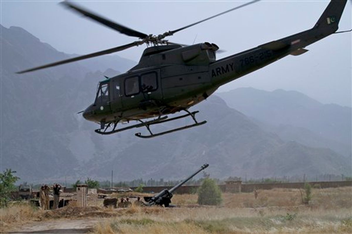 A Pakistan army helicopter take off as troops wait for clearance to use heavy artillery towards alleged militants hideouts in the mountain ranges in Mamad Gat, in Pakistan's Mohmand tribal region along the Afghan border, Wednesday, June 1, 2011. A top Pakistani army commander said that the military has no imminent plans to launch an offensive in the North Waziristan tribal region, home to numerous militants who focus on attacking U.S. and NATO forces in neighboring Afghanistan. (AP Photo/Anjum Naveed) (AP)