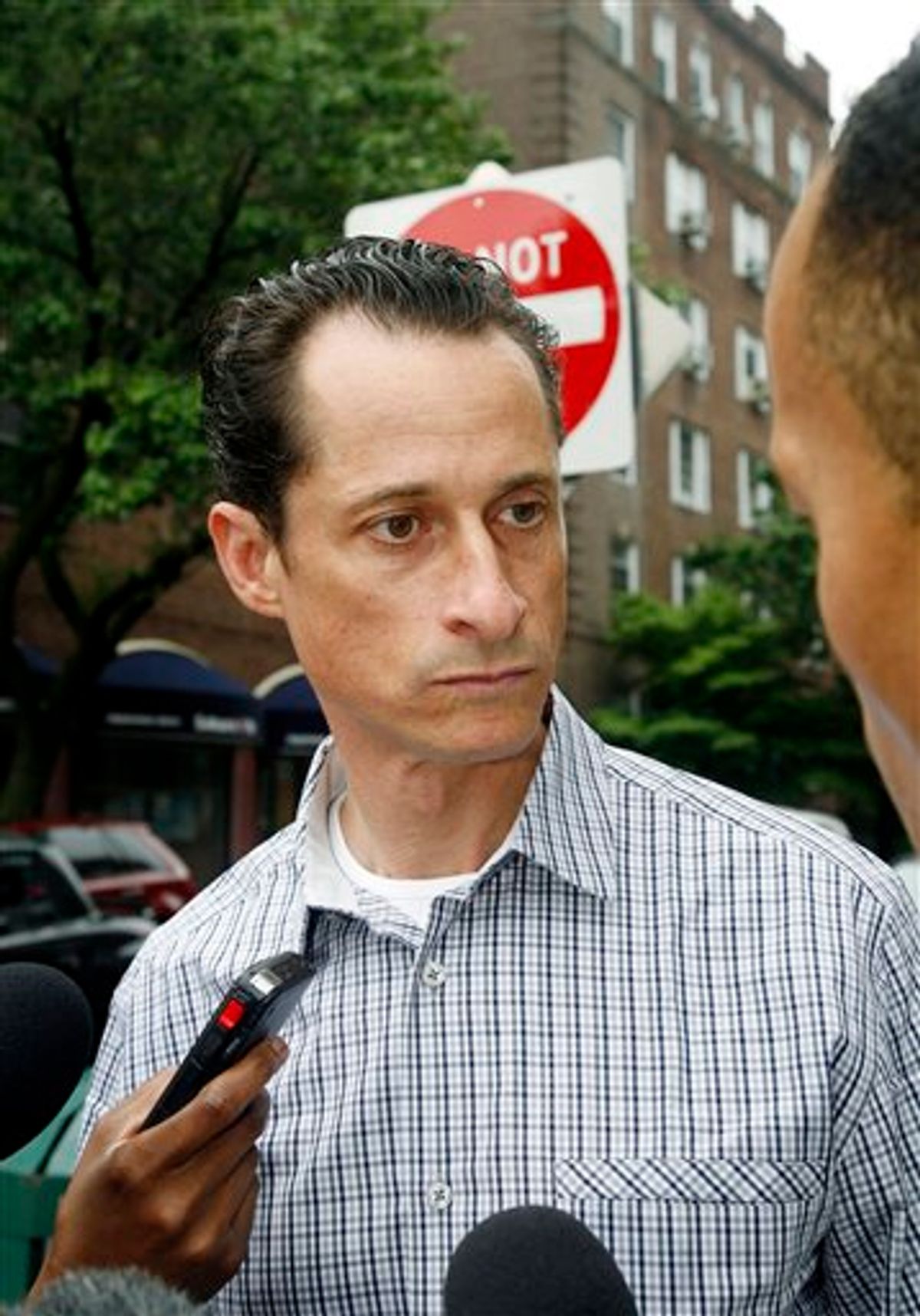 Rep. Anthony Weiner, D-N.Y., answers questions from the media as he carries his laundry to a laundromat near his home in the Queens borough of New York, Saturday, June  11, 2011. The 46-year-old congressman acknowledged Friday that he had online contact with a 17-year-old girl from Delaware but said there was nothing inappropriate. (AP Photo/David Karp) (AP)