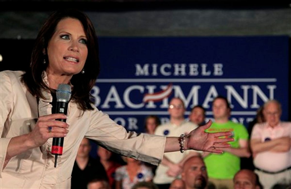 U.S. Rep. Michele Bachmann, R-Minn., addresses the crowd during a welcome home event in her hometown of Waterloo, Iowa Sunday, June 26, 2011. Republican Rep. Michele Bachmann said Sunday her bid to unseat President Barack Obama shouldn't be viewed as "anything personal" against the Democrat  he's "just wrong" on his policies for America. (AP Photo/Charlie Riedel) (AP)