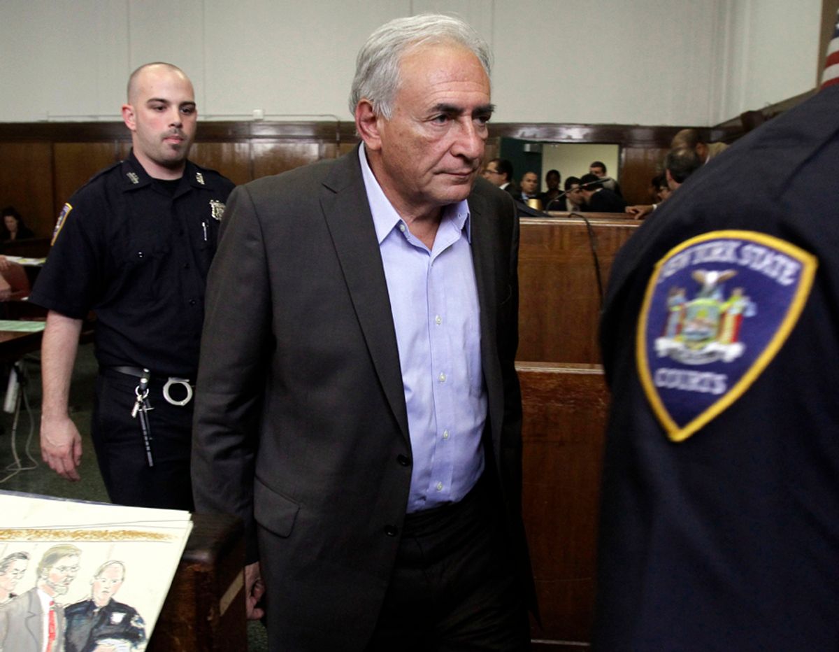International Monetary Fund leader Dominique Strauss-Kahn leaves court court after his bail hearing in New York state Supreme Court,  Thursday, May 19, 2011.   A judge agreed to free Strauss-Kahn from a New York City jail on the condition that he post $1 million in bail and remain under house arrest, under the watch of armed guards, at a private apartment in Manhattan.  (AP Photo/Richard Drew, Pool) (Richard Drew)