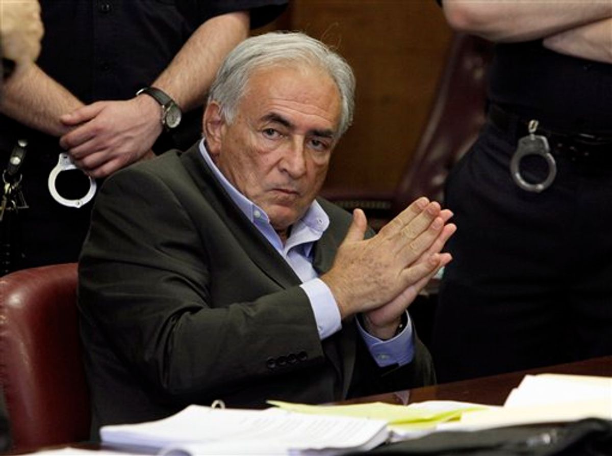 ** CORRECTS COURT DAY TO MONDAY AND ADDS DATE ** FILE - In this May 19, 2011 file photo, former International Monetary Fund leader Dominique Strauss-Kahn listens to proceedings in his case in New York state Supreme Court. Strauss-Kahn is due to answer the charges in court in New York Monday June 6, 2011 that he assaulted a hotel maid. (AP Photo/Richard Drew, File) (AP)