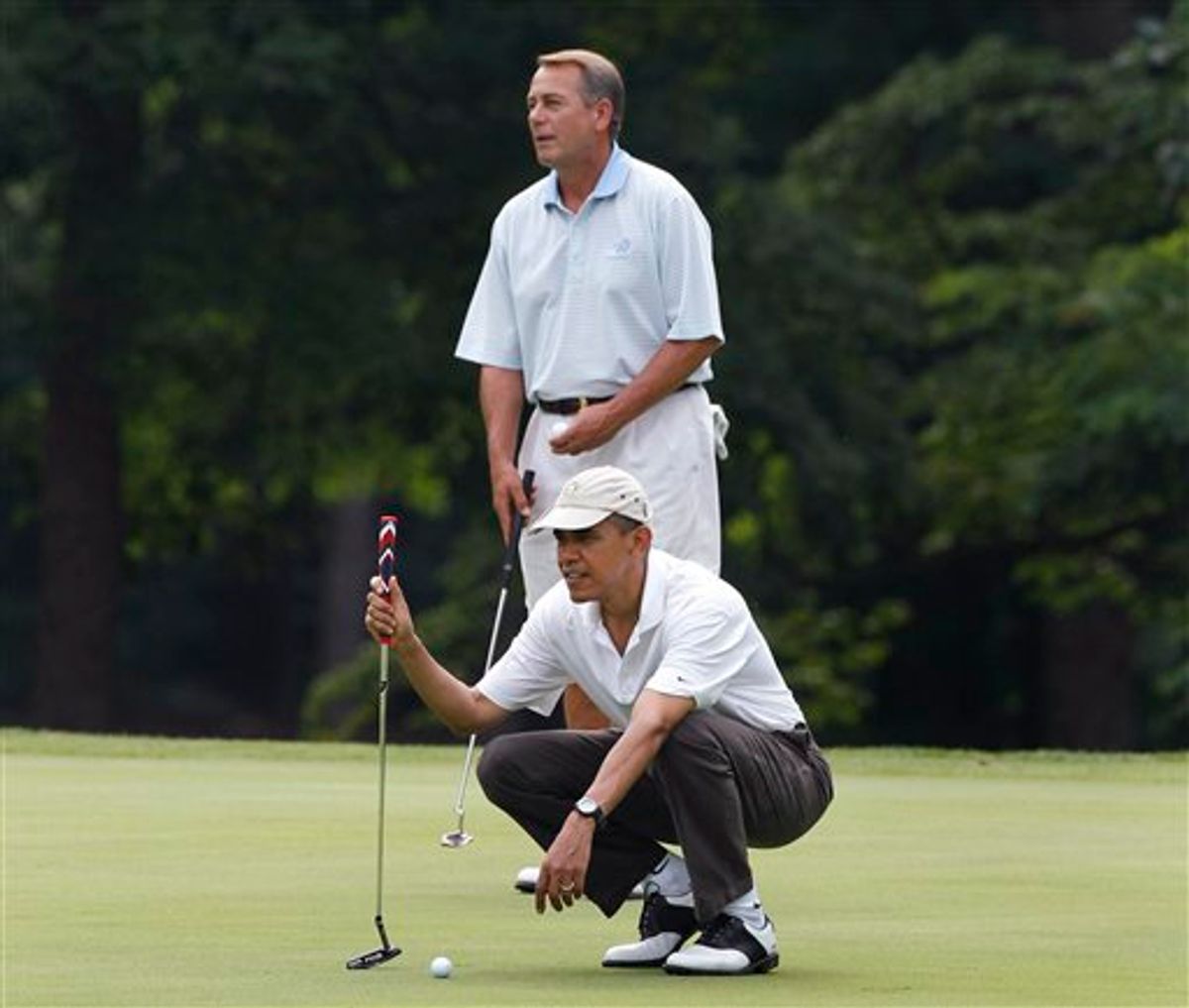 President Barack Obama and House Speaker John Boehner, R-Ohio, are on the first hole as they play golf at Andrews Air Force Base, Md.,  Saturday, June 18, 2011. (AP Photo/Charles Dharapak) (AP)