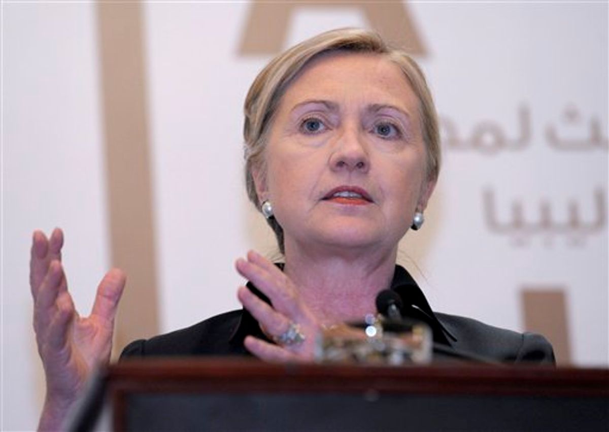 Secretary of State Hillary Rodham Clinton speaks during a news conference at the Emirates Palace Hotel in Abu Dhabi, United Arab Emirates, Thursday, June 9, 2011, following the Third Contact Group Meeting on Libya. (AP Photo/Susan Walsh, Pool) (AP)