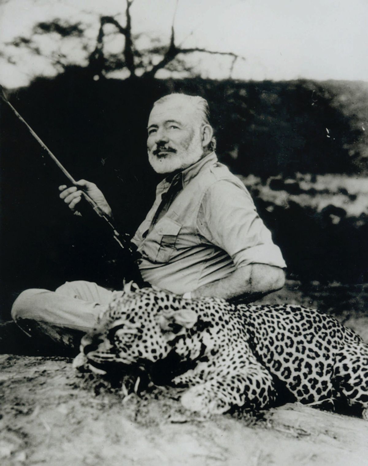 Ernest Hemingway poses with a dead leopard in 1953, part of an exhibit of Hemingway photos to celebrate his 100th birthday on display at Washington's National Portrait Gallery through Nov. 7, 1999. Hemingway, who killed himself three weeks before his 61st birthday, would have been 100 on July 21. (AP Photo/National Portrait Gallery, Earl Theisen)  (Earl Theisen)