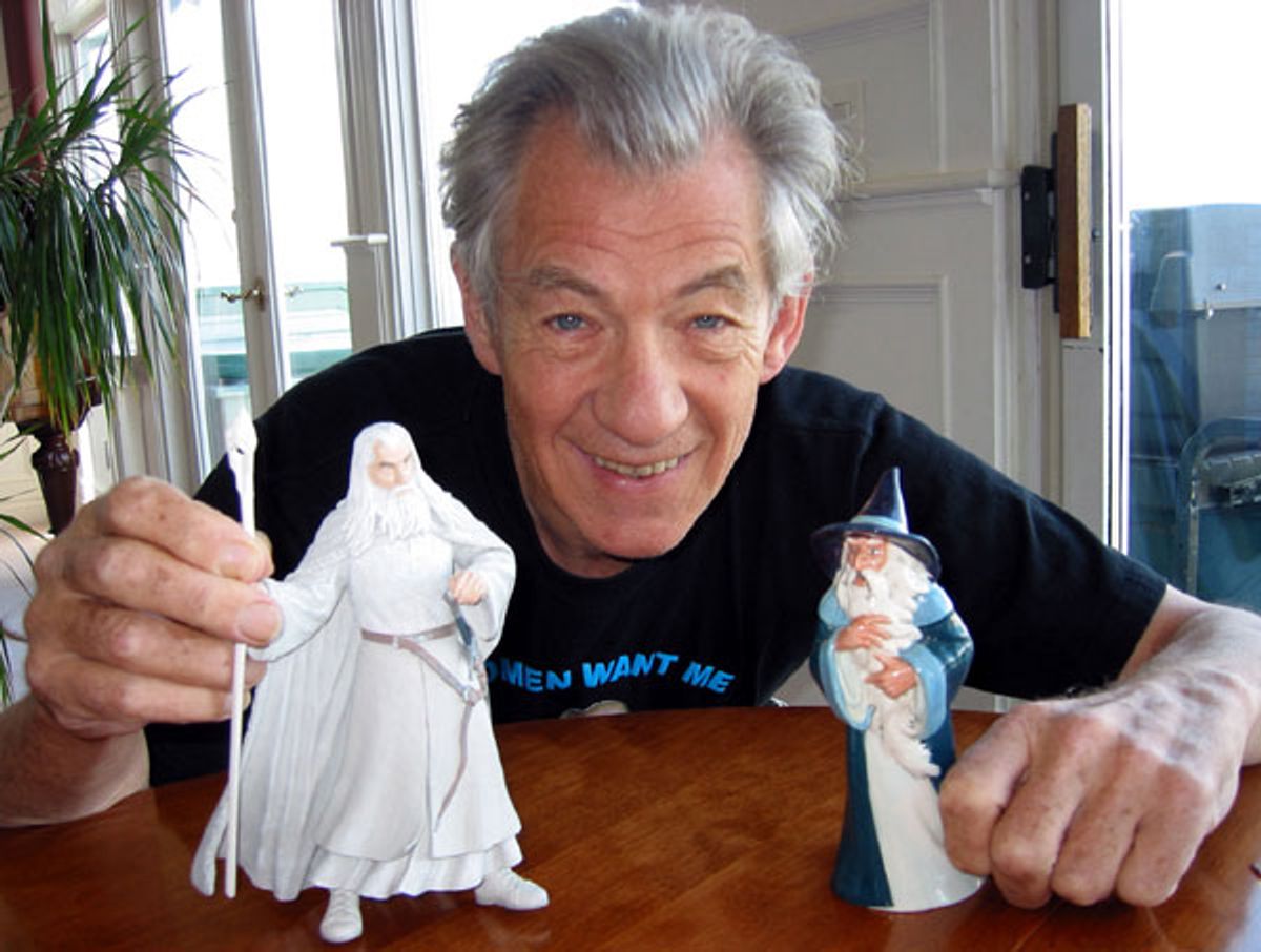 Ian McKellen plays with dolls.