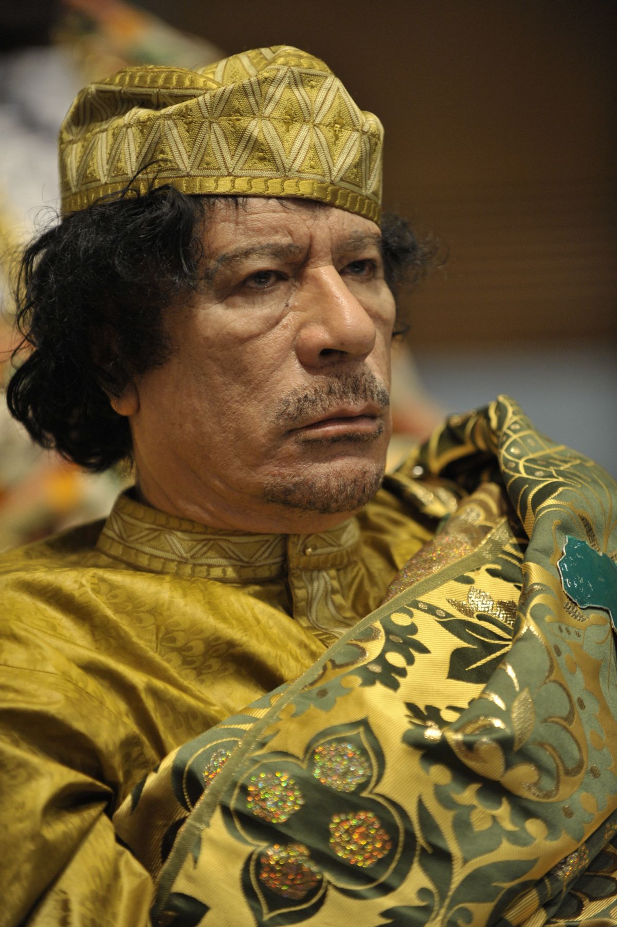 Muammar Qaddafi, the Libyan chief of state, attends the 12th African Union Summit in Addis Ababa, Ethiopia, Feb. 2, 2009. Qaddafi was elected chairman of the organization. (U.S. Navy photo by Mass Communication Specialist 2nd Class Jesse B. Awalt/Released)     (Cjtf-hoa/pao)