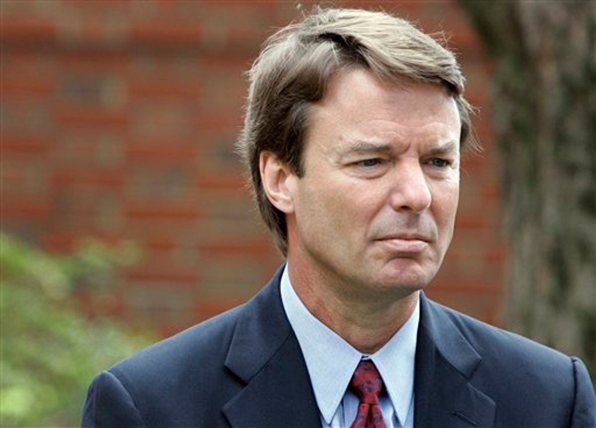 FILE - In this March 22, 2007, file photo Democratic presidential hopeful John Edwards listens to his wife Elizabeth, not shown, talk to media about her recurrence of cancer during a news conference in Chapel Hill, N.C. The legal case against two-time presidential candidate focuses on where to draw the line between the public and private in a politician's life. The central dispute over Edwards' indictment on felony charges is whether money, spent by two supporters to keep his mistress in hiding, were campaign contributions or private gifts from friends. (AP Photo/Gerry Broome, File) (AP)