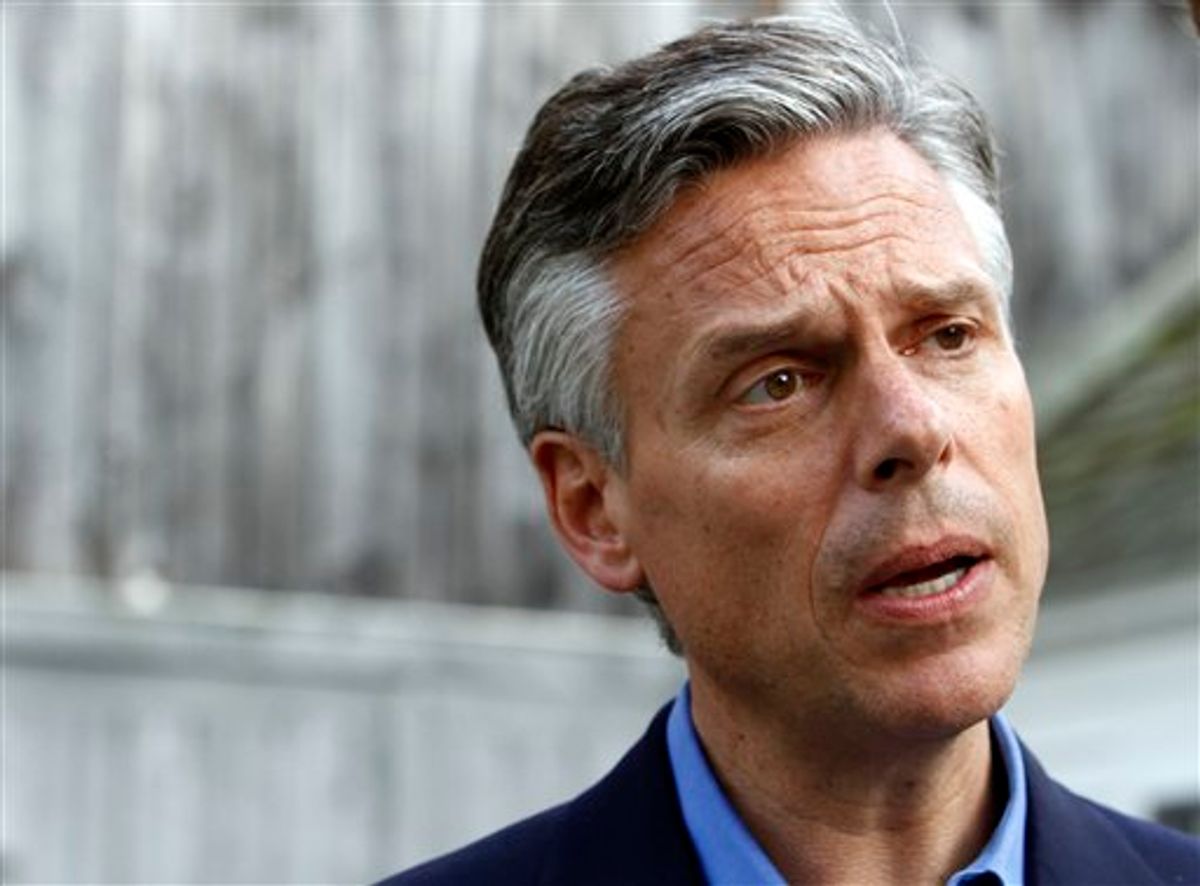 FILE - In this June 10, 2011 file photo, possible 2012 presidential hopeful, former Republican Gov. Jon Huntsman, Jr., of Utah, speaks to a reporter at a gathering at the home of Nancy and Wally Stickney in Salem, N.H. (AP Photo/Elise Amendola) (AP)