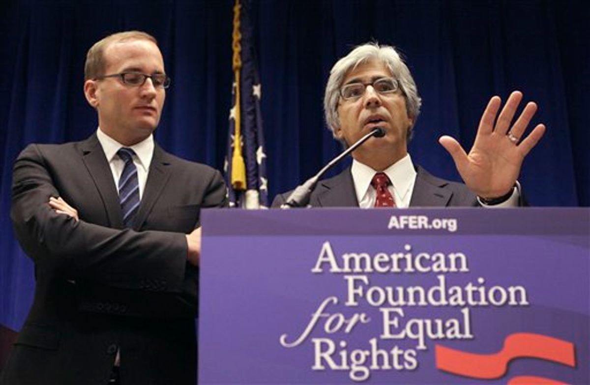 Attorney Theodore Boutrous, right, speaks next to Chad Griffin, Board President of the American Foundation for Equal Rights, during a news conference at the Phillip Burton Federal Building in San Francisco, Monday, June 13, 2011. A retired federal judge's long-term relationship with another man was the subject of an unusual and possibly unprecedented court hearing that began Monday involving California's same-sex marriage ban. Lawyers for the sponsors of the voter-approved ban asked the chief federal judge in San Francisco to vacate a decision issued by his predecessor last year that declared the same sex marriage ban an unconstitutional violation of gay Californians' civil rights. (AP Photo/Jeff Chiu) (AP)