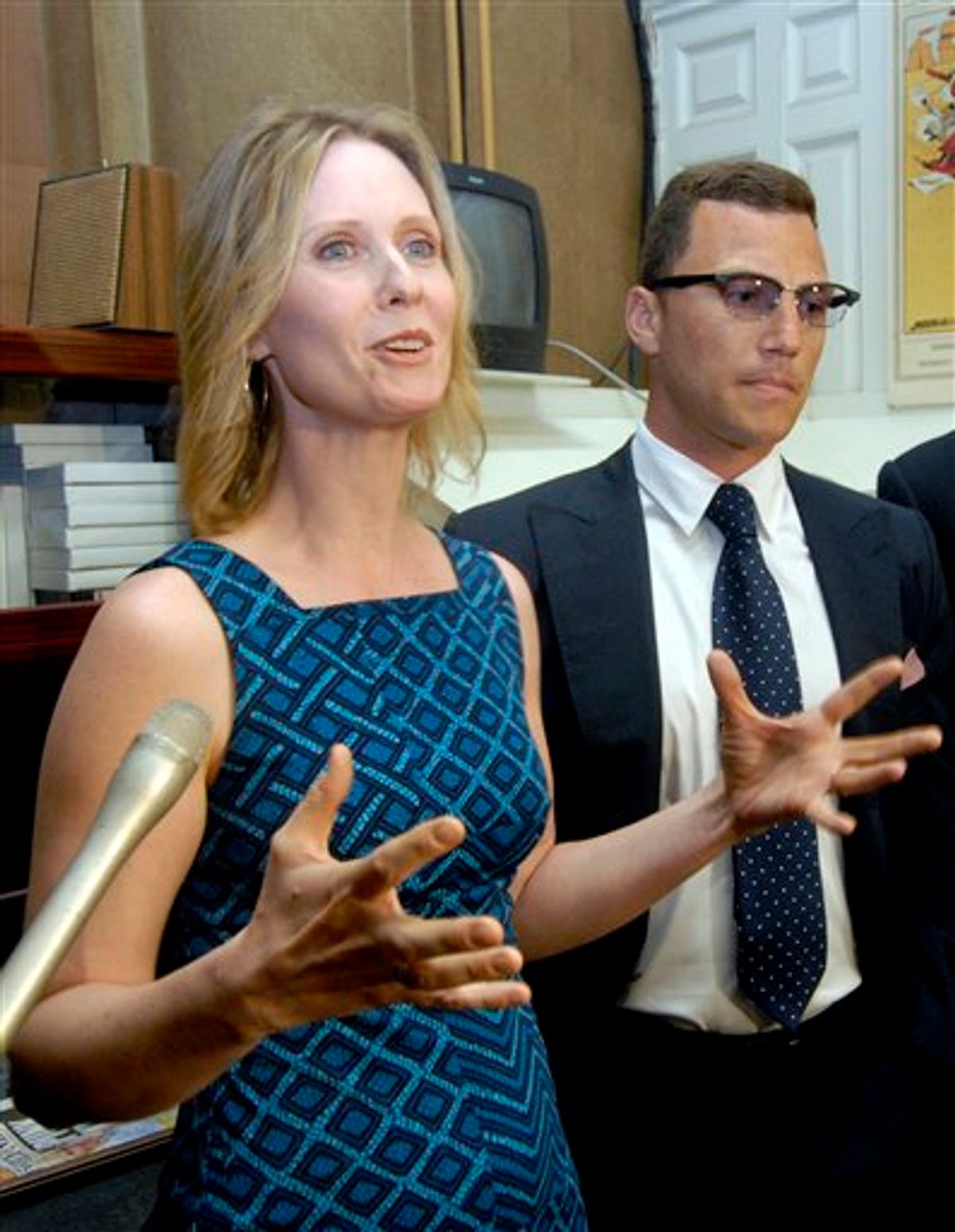 Actress Cynthia Nixon, left, and New York Rangers' Sean Avery talk with reporters after asking lawmakers to pass legislation to legalize same-sex marriage in New York at the Capitol in Albany, N.Y., Tuesday, June 14, 2011.  The New York state Senate's Republican majority is facing an all-out effort by Democrats to legalize gay marriage in the last days of the session and reinvigorate the national movement.   (AP Photo/Hans Pennink) (AP)