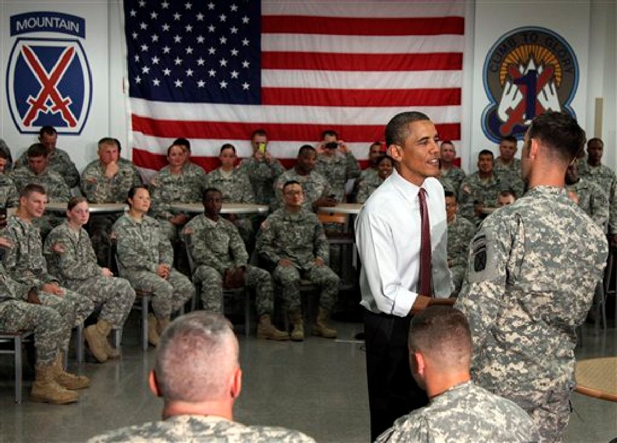 President Barack Obama visits with soldiers from the 10th Mountain Division, many of whom have just returned from Afghanistan, Thursday, June 23, 2011, in Fort Drum, N.Y.  (AP Photo/Carolyn Kaster) (AP)