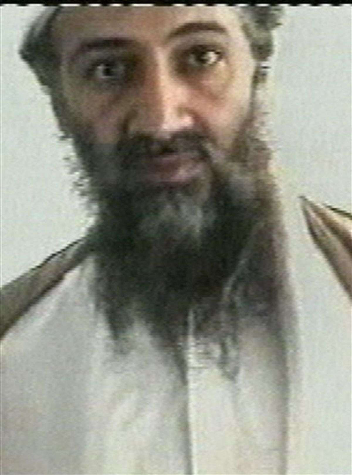 FILE - This undated image taken from video released by Al-Jazeera television on Oct. 5, 2001, shows Osama bin Laden at an undisclosed location. A cellphone of bin Laden's trusted courier recovered in the U.S. raid last month that killed both men in Pakistan contained contacts to a militant group that is a longtime asset of Pakistan's intelligence agency, The New York Times reported late Thursday. (AP Photo/Courtesy of Al-Jazeera via APTN, File) (AP)