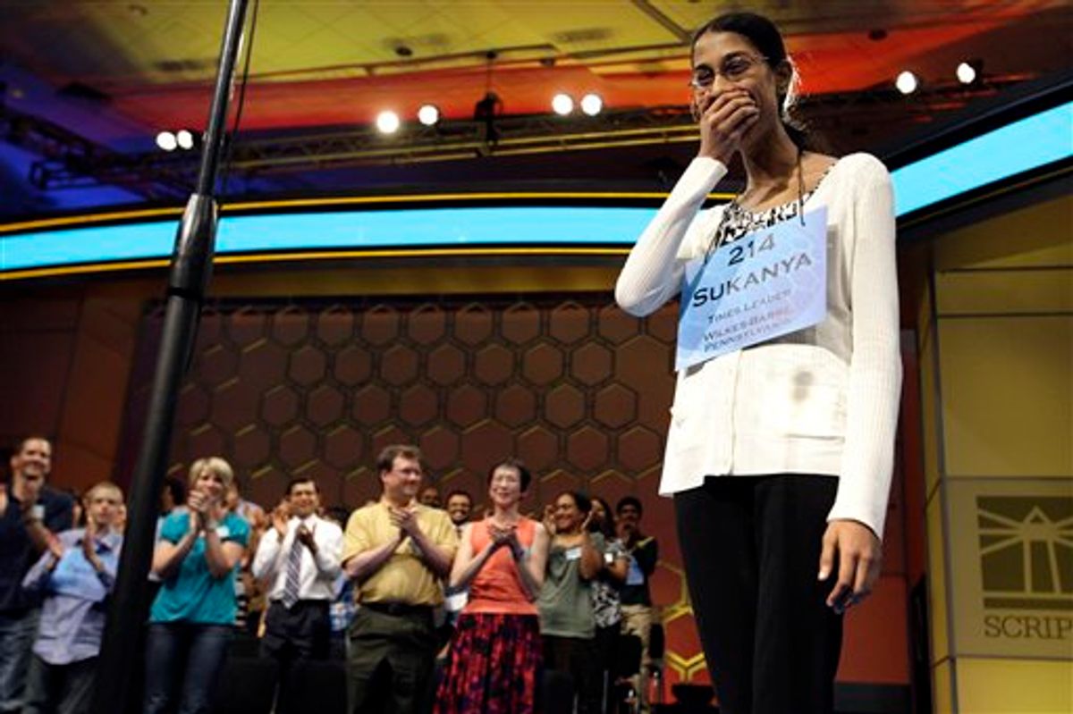 Sukanya Roy, 14, of South Abington Township, Pa., reacts after winning the National Spelling Bee, in Oxon Hill, Md. on Thursday, June 2, 2011. She won by spelling the word cymotrichous, which means wavy hair. (AP Photo/Jacquelyn Martin) (AP)