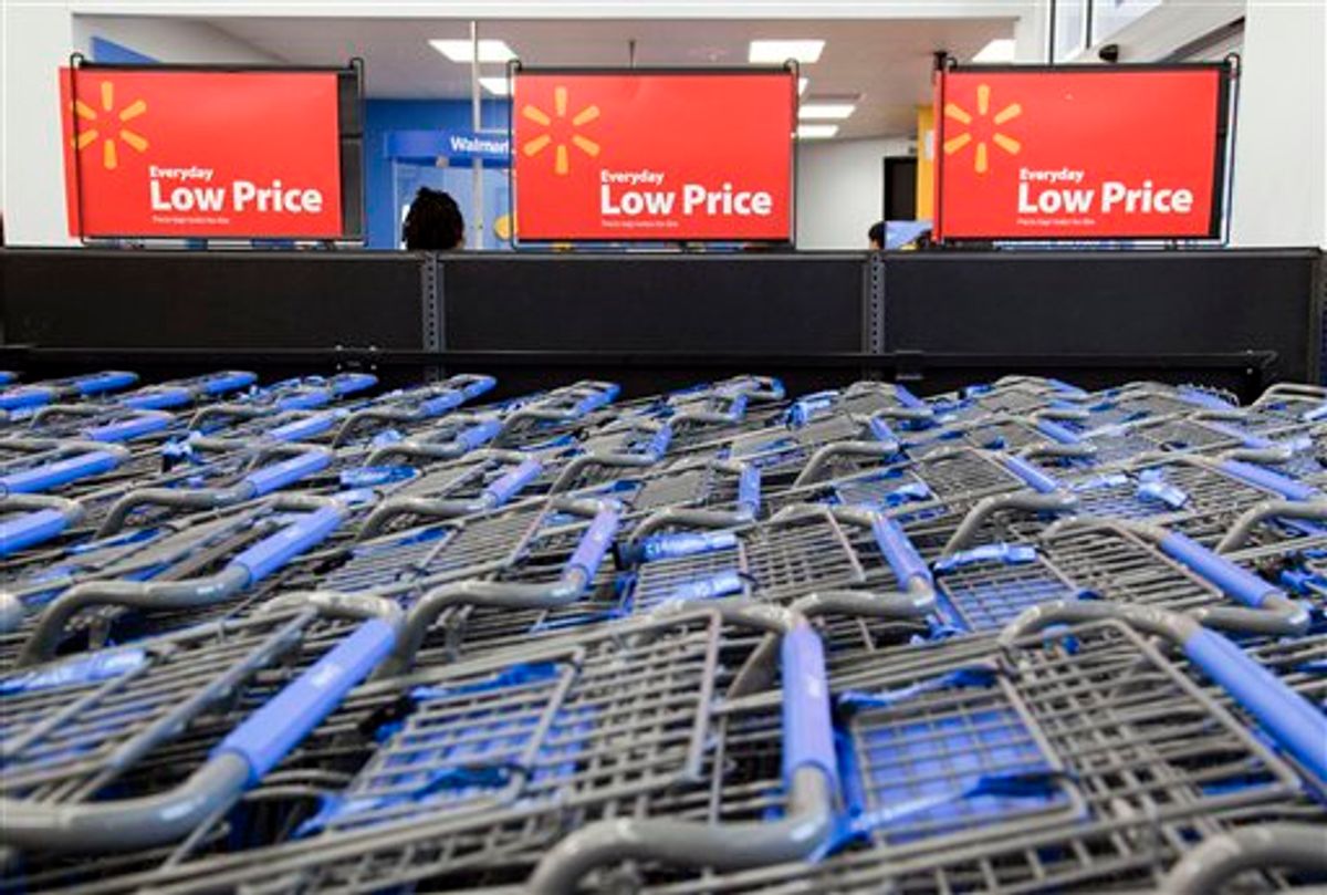 FILE - In this file photo take Dec. 15, 2010, shopping carts are shown inside a Wal-Mart store in Alexandria, Va. As Wal-Mart Stores Inc., the world's largest retailer, restores thousands of products it slashed in an overzealous bid to clean up its stores, it's going back to its roots like catering to enthusiasts of hunting and fishing, while experimenting in new areas. (AP Photo)  (AP)