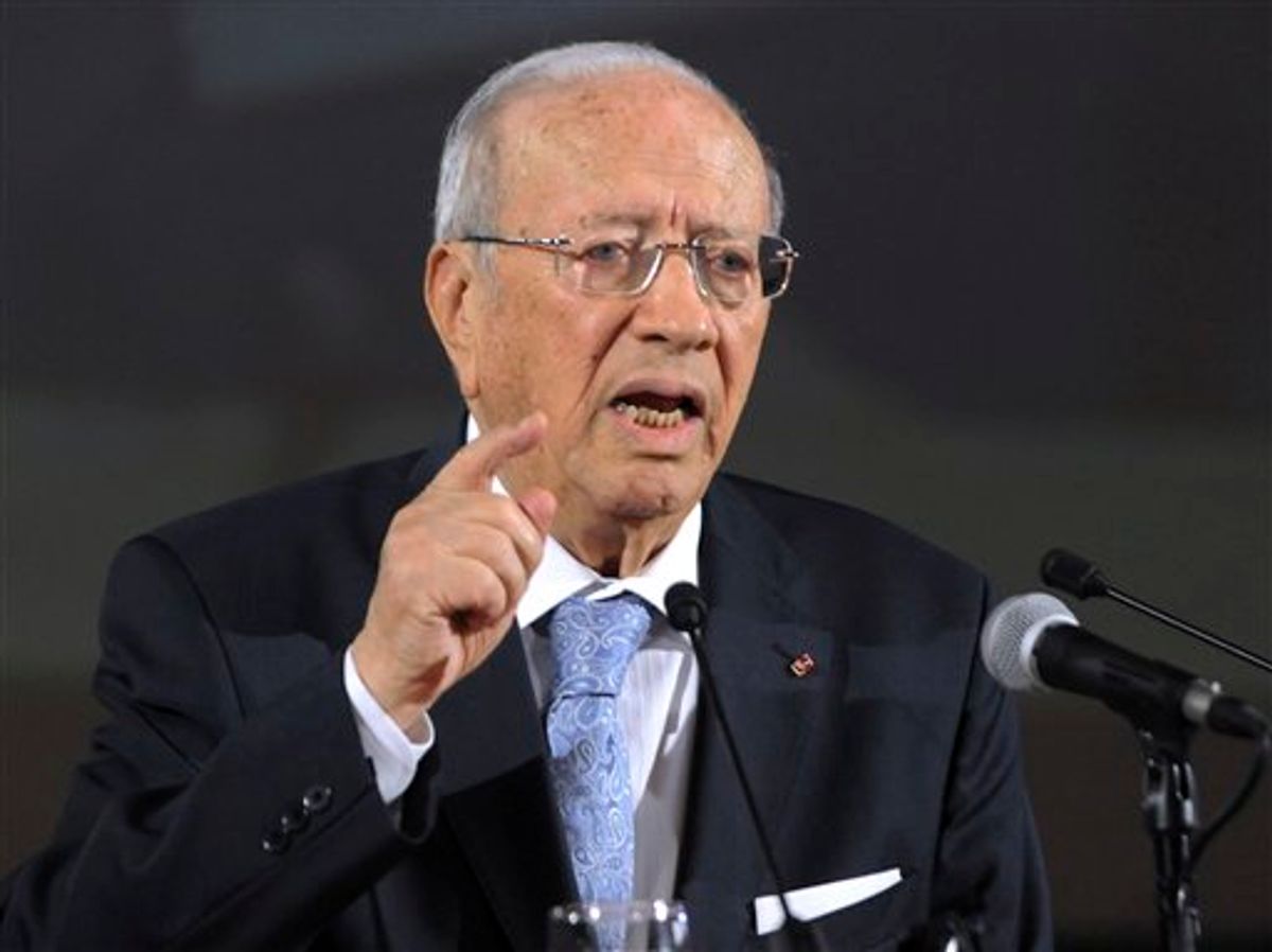 Tunisian Prime Minister Beji Caid Essebsi addresses reporters during a press conference held in Tunis, Wednesday June 8, 2011. Tunisia is delaying its first elections since the ouster of the country's longtime autocratic president, the prime minister announced Wednesday, setting a new date of Oct. 23. (AP Photo/Hassene Dridi) (AP)