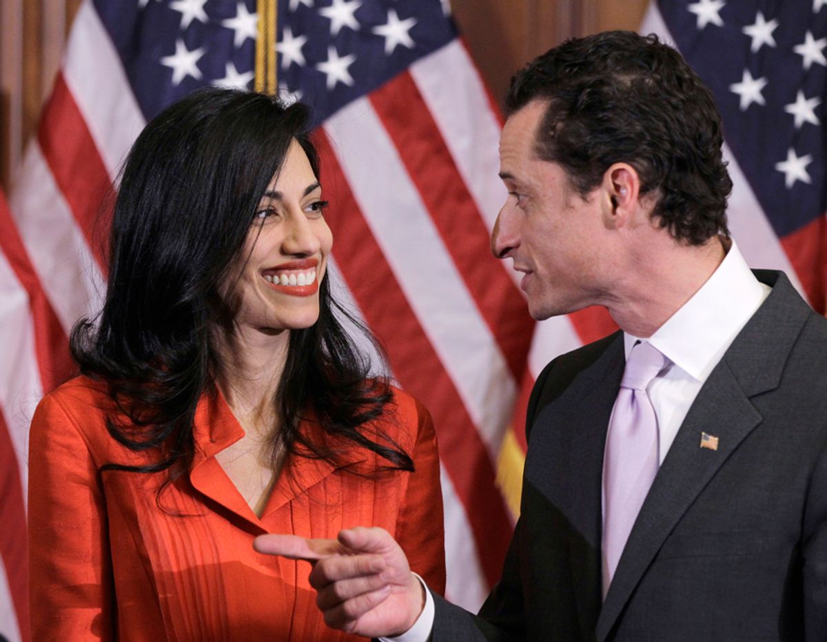 Rep. Anthony Weiner, D-N.Y., and his wife, Huma Abedin, an aide to Secretary of State Hillary Rodham Clinton, are pictured after a ceremonial swearing in of the 112th Congress on Capitol Hill in Washington in this photo taken Jan. 5, 2011. (AP Photo/Charles Dharapak) (Charles Dharapak)