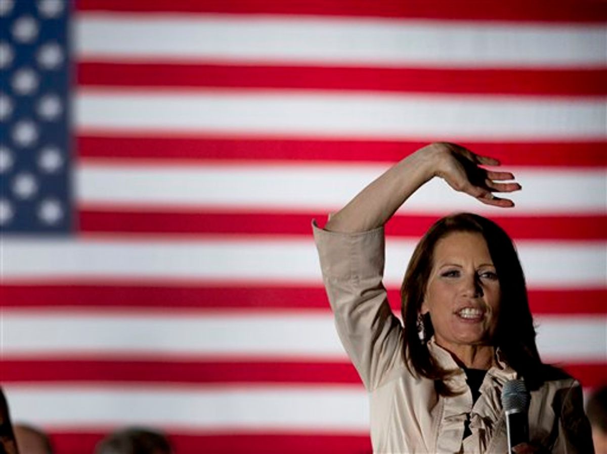U.S. Rep. Michele Bachmann, R-Minn., waves to the crowd during a welcome home event in her hometown of Waterloo, Iowa Sunday, June 26, 2011. Bachmann said Sunday her bid to unseat President Barack Obama shouldn't be viewed as "anything personal" against the Democrat. (AP Photo/Charlie Riedel) (AP)