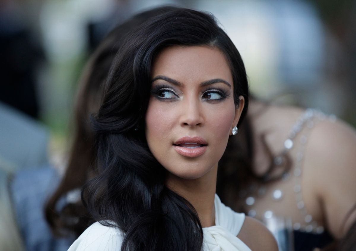 U.S. entertainment icon Kim Kardashian looks on as she addends a charity fashion show in Monaco, Friday, May 27, 2011. The Monaco Formula One Grand Prix will take place here on Sunday, May 29, 2010. (AP Photo/Luca Bruno) (Associated Press)