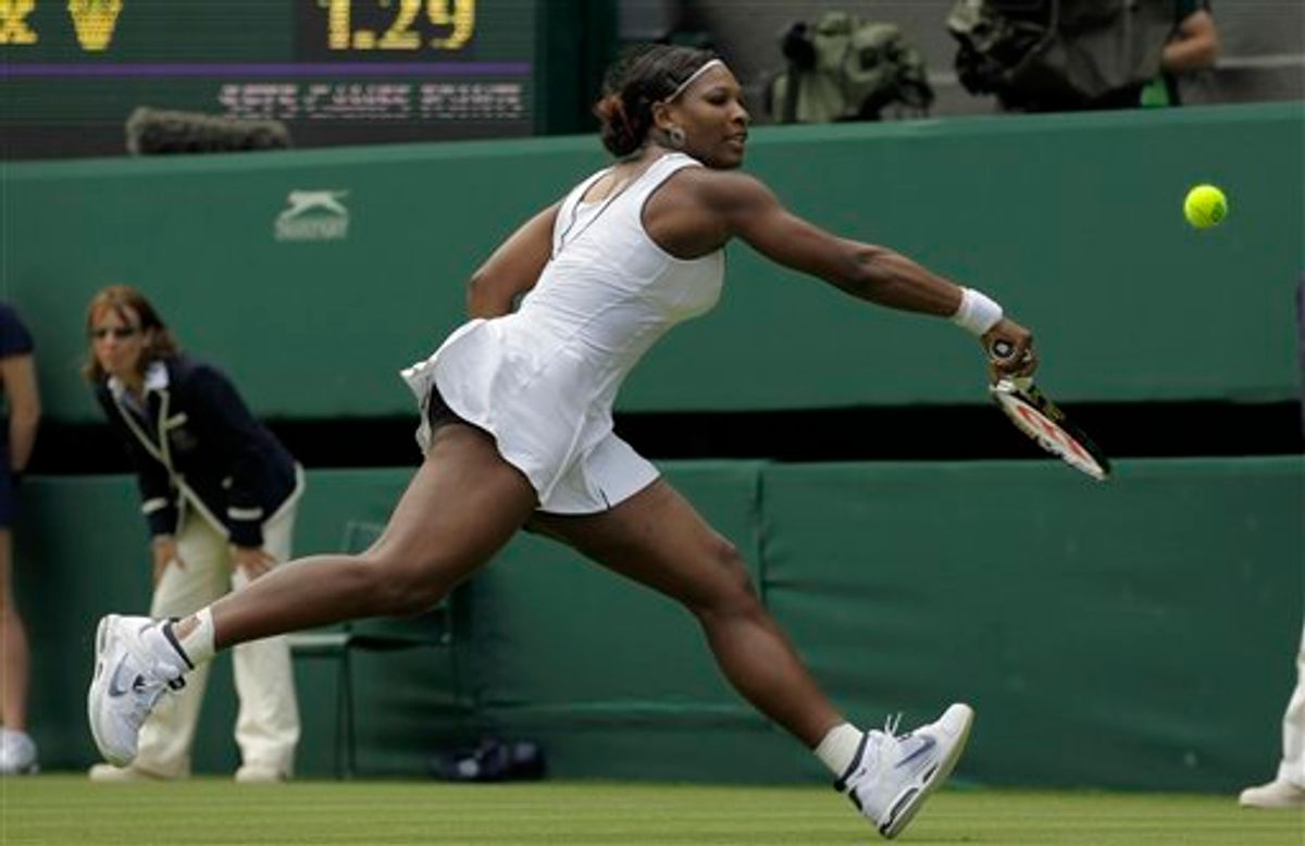Serena Williams of the US returns a shot to France's Aravane Rezai at the All England Lawn Tennis Championships at Wimbledon, Tuesday, June 21, 2011. (AP Photo/Sang Tan) (AP)