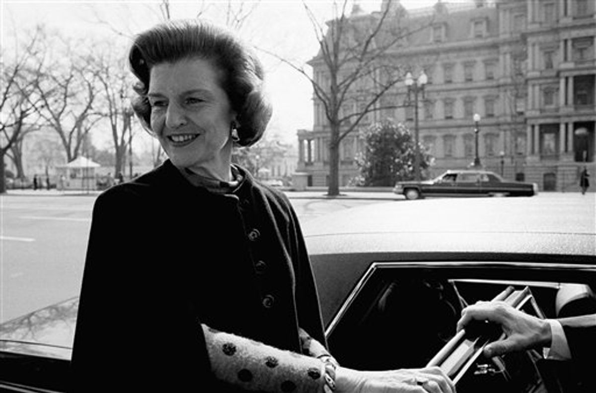 FILE - In this Thursday, Feb. 21, 1975 file picture, first lady Betty Ford prepares to enter an automobile in Washington after attending a Chamber of Commerce reception. Ford, the former first lady whose triumph over drug and alcohol addiction became a beacon of hope for addicts and the inspiration for her Betty Ford Center, has died, a family friend said Friday, July 8, 2011. She was 93. (AP Photo/Chick Harrity) (AP)