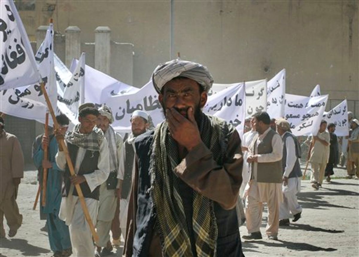 Afghans carrying anti Pakistan slogans during a demonstration in Kabul, Afghanistan on Saturday, July 2, 2011. Several hundred people demonstrated against rocket attacks that have killed an estimated 36 civilians along the eastern border with Pakistan in recent weeks. Pakistan's army has said no rounds were intentionally fired but that some may have accidentally fallen in Afghanistan in fighting with militants carrying out cross-border attacks. (AP Photo/Musadeq Sadeq) (AP)