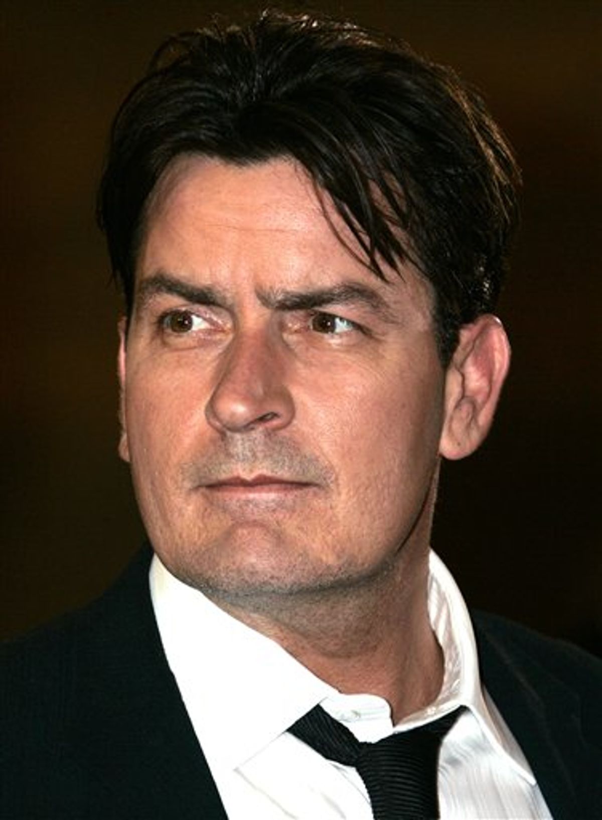 FILE - This May 21, 2006 file photo shows actor Charlie Sheen as he arrives for the screening of the film "Platoon,"at the 59th International Film Festival in Cannes, France. Los Angeles Superior Court Judge Allan Goodman ruled Wednesday, June 15, 2011, that Sheen's $100 million lawsuit over his firing from Two and a Half Men should be handled through private arbitration rather than in a public courtroom. (AP Photo/Kirsty Wigglesworth, File) (AP)