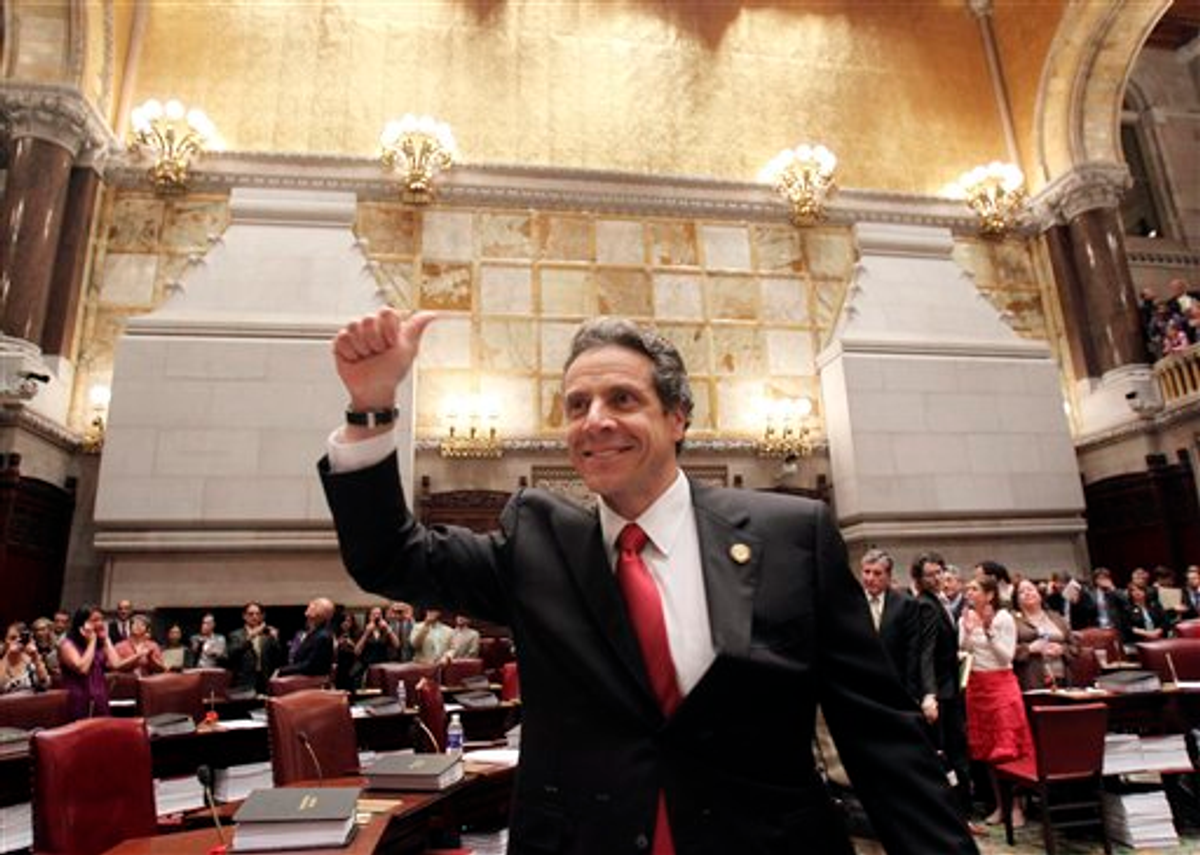 New York Gov. Andrew Cuomo reacts after same-sex marriage is legalized after a vote in the state Senate on June 24.    