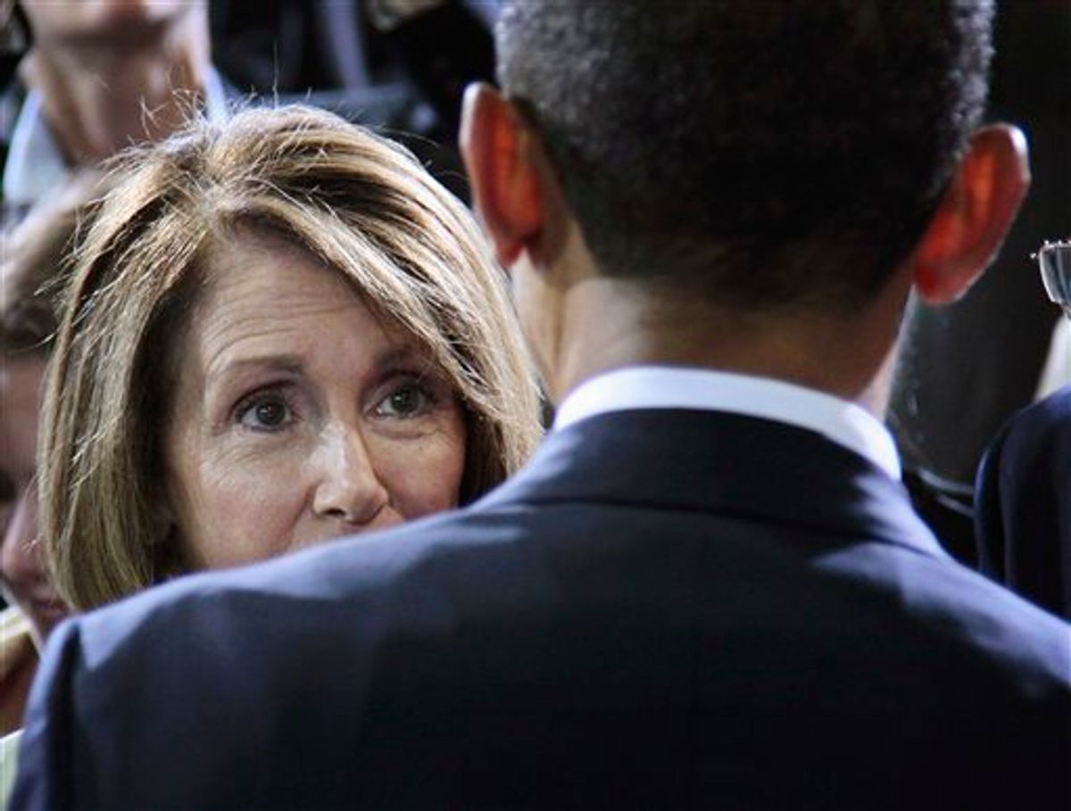 President Barack Obama speaks with House Minority Leader Nancy Pelosi of Calif.,  at the Washington Convention Center in Washington, Friday, July 29, 2011, after delivering remarks on improved Fuel Efficiency Standards for cars and light trucks. (AP Photo/Pablo Martinez Monsivais)   (AP)