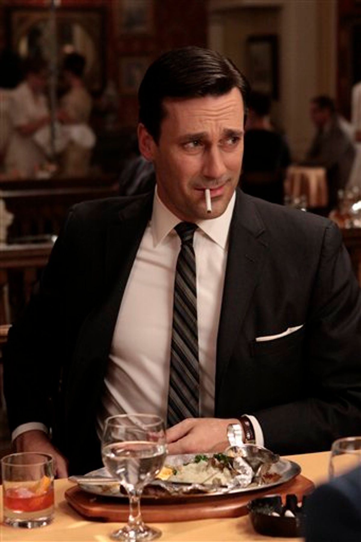 In this publicity image released by AMC, Jon Hamm portrays Don Draper in the AMC series, "Mad Men." The series was nominated for an Emmy for best drama series, and Jon Hamm was nominated for best actor in a drama series on Thursday, July 14, 2011. The Emmy awards will be presented on Sept. 18. (AP Photo/AMC)     (AP)