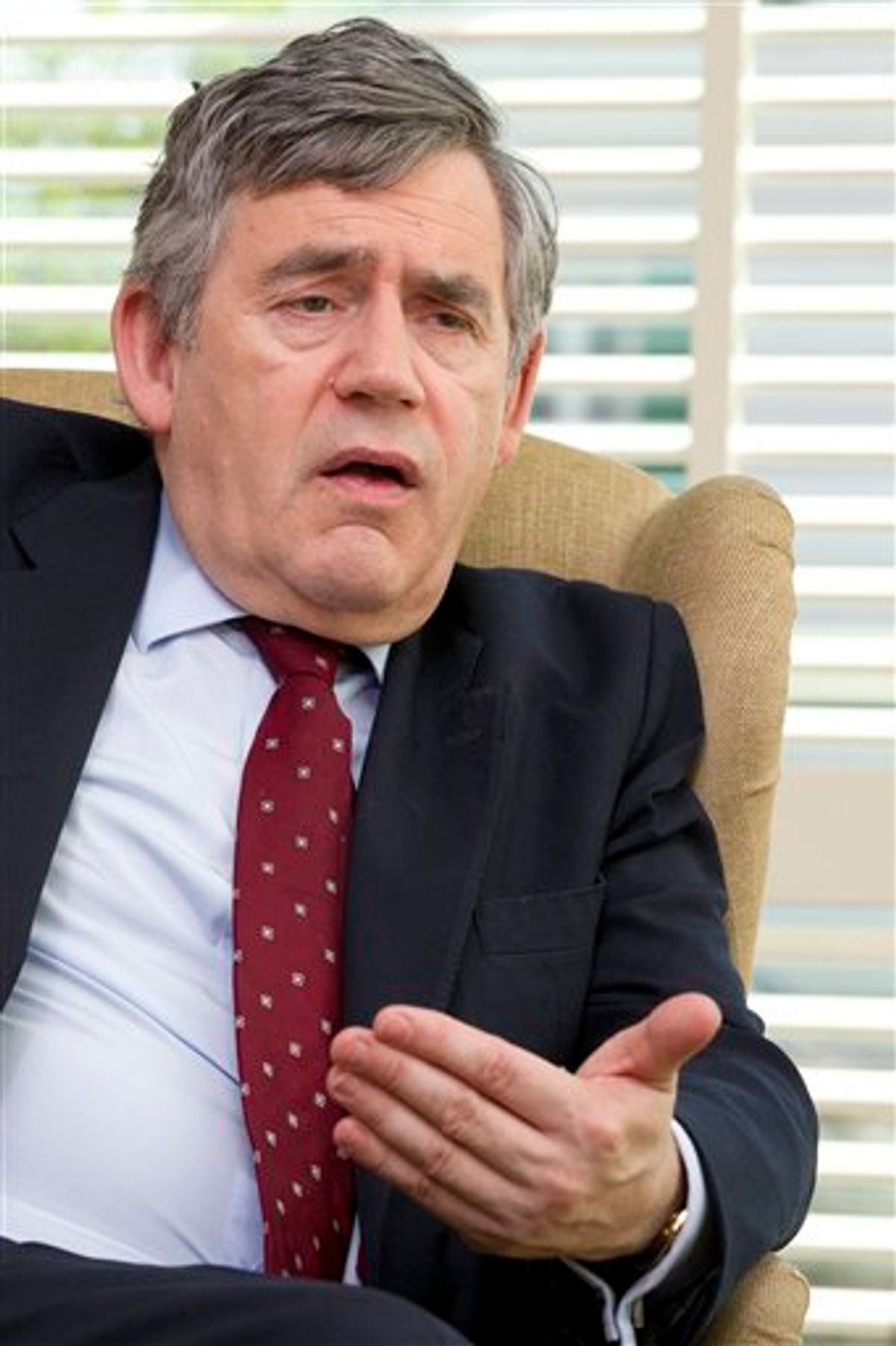 FILE - This is a Tuesday, April 5, 2011 file photo of former British Prime Minister Gordon Brown answers question during an interview with The  Associated Press in  Geneva, Switzerland.   British media say that former Prime Minister Gordon Brown had his personal information targeted by elements of Rupert Murdoch's media empire. (AP Photo/Salvatore Di Nolfi, File) (AP)