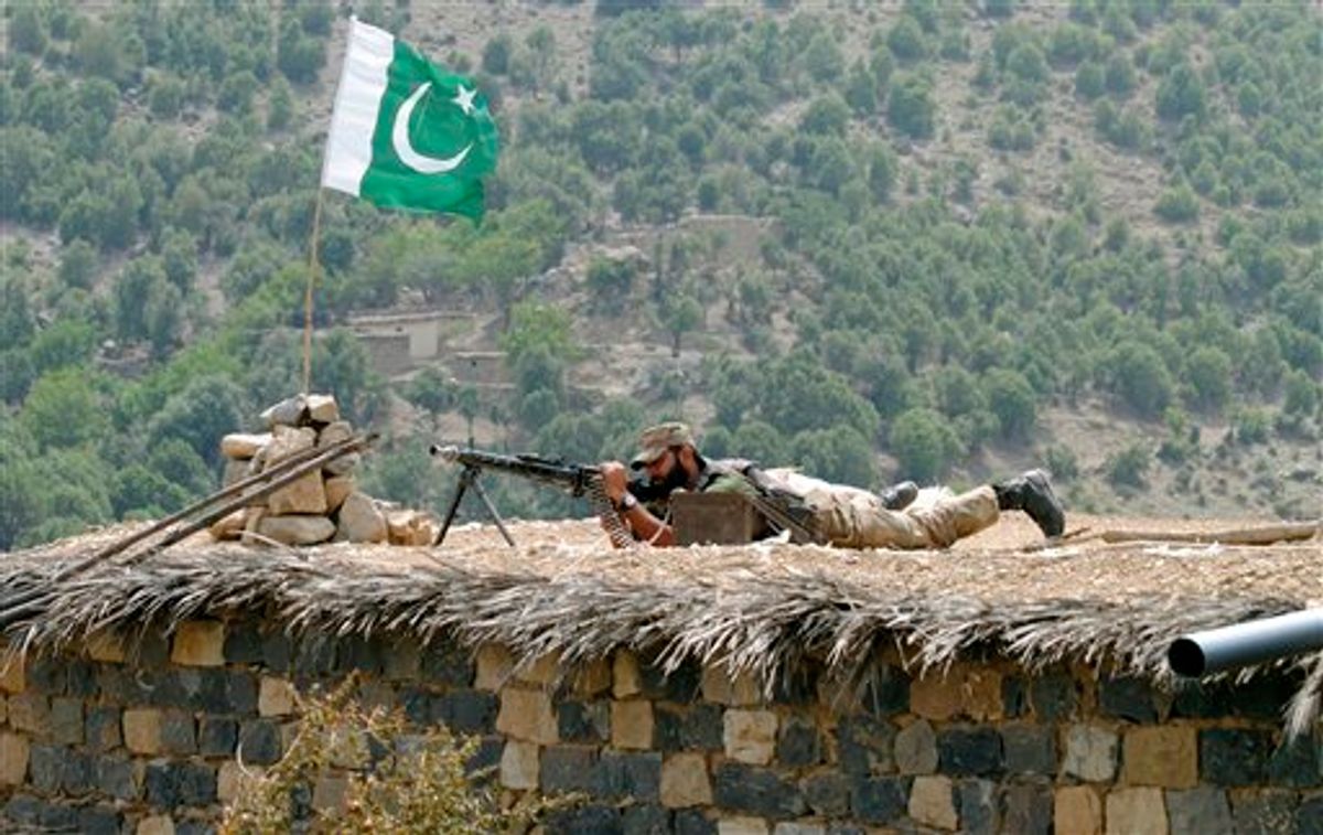 A Pakistani army soldier takes a position during a military operation against militants in Pakistan's Khurram tribal region, Sunday, July 10, 2011.  A military operation in Kurram tribal region has been launched to clear the area of terrorists involved in various terrorist activities, including kidnapping and killing of locals, suicide attacks and blocking the road connecting Lower with upper Kurram, Pakistani army spokesman Maj. Gen. Athar Abbas said. (AP Photo/Mohammad Zubair) (AP)