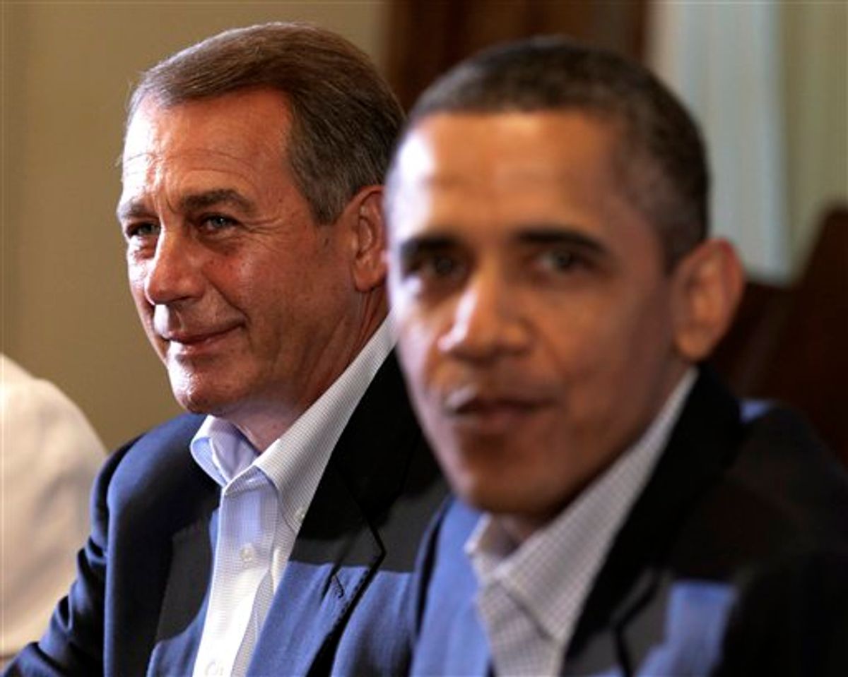 House Speaker John Boehner of Ohio, left, and President Barack Obama meet with congressional leaders in the Cabinet Room of the White House,Sunday, July 10, 2011, in Washington, to discuss the debt. (AP Photo/Carolyn Kaster) (AP)