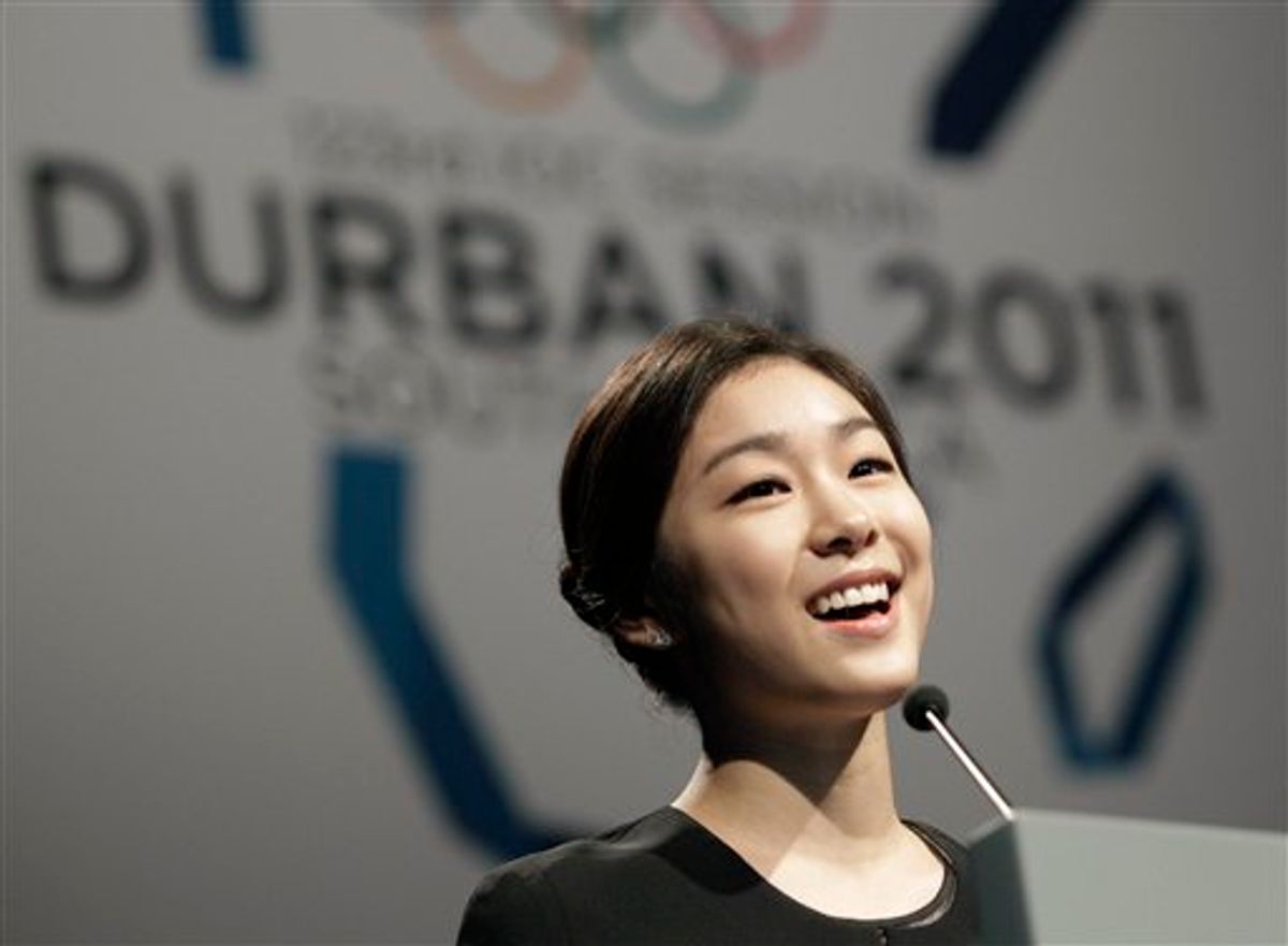 South Korea's figure skater and Olympic champion Kim Yu-na  during the presentation of the  Pyeongchang bid , in front of the 123rd International Olympic Committee (IOC) session that will decide the host city for the 2018 Olympics Winter Game, in Durban, South Africa, Wednesday July 6, 2011. The International Olympic Committee will announce the host city for the 2018 Winter Olympics in Durban, Wednesday, choosing between three candidates Annecy, France; Munich Germany; and Pyeongchang, South Korea for the 2018 host. (AP Photo/Rogan Ward, Pool) (AP)