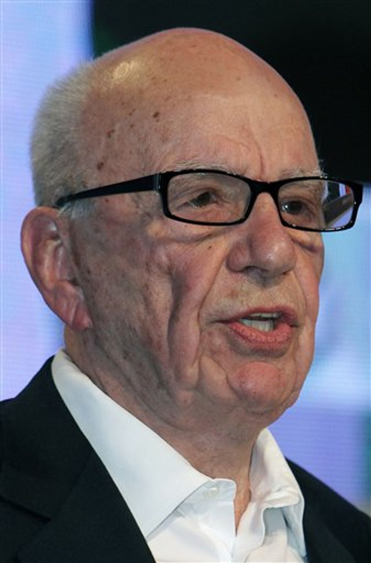 FILE - In this May 24, 2011 file photo, media magnate Rupert Murdoch speaks during the e-G8 conference, gathering Internet and information technologies leaders and experts, in Paris. Britain's prime minister demanded inquiries into a burgeoning phone hacking scandal as allegations mounted Wednesday, July 6, 2011, that a tabloid eavesdropped on missing schoolgirls and the families of terrorist bombing victims as well as celebrities and royals. The scandal poses a threat to Murdoch's global media empire, and is causing a growing number of companies to pull their ads from the News of the World tabloid in disgust. In addition, calls are mounting for Rebekah Brooks, Murdoch's top executive in Britain, to step down. (AP Photo/Bob Edme, File)  (AP)